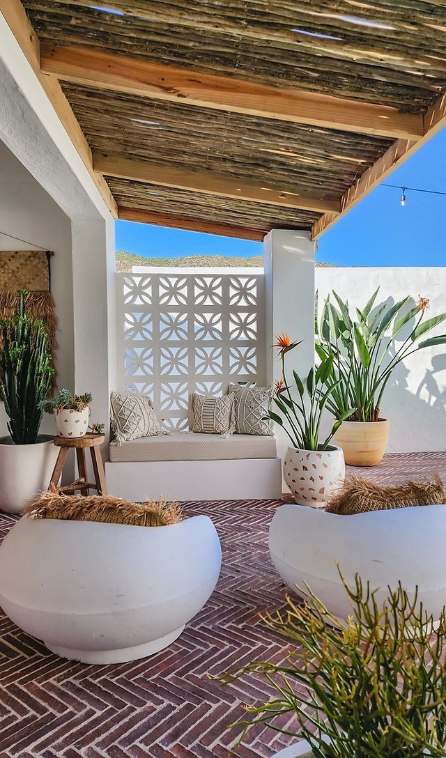 Mediterranean patio with natural materials and plants