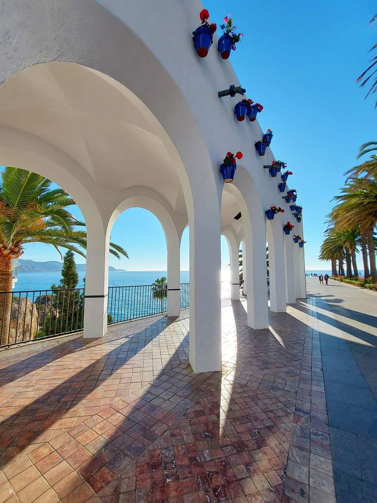 White arches opening toward the Mediterranean sea
